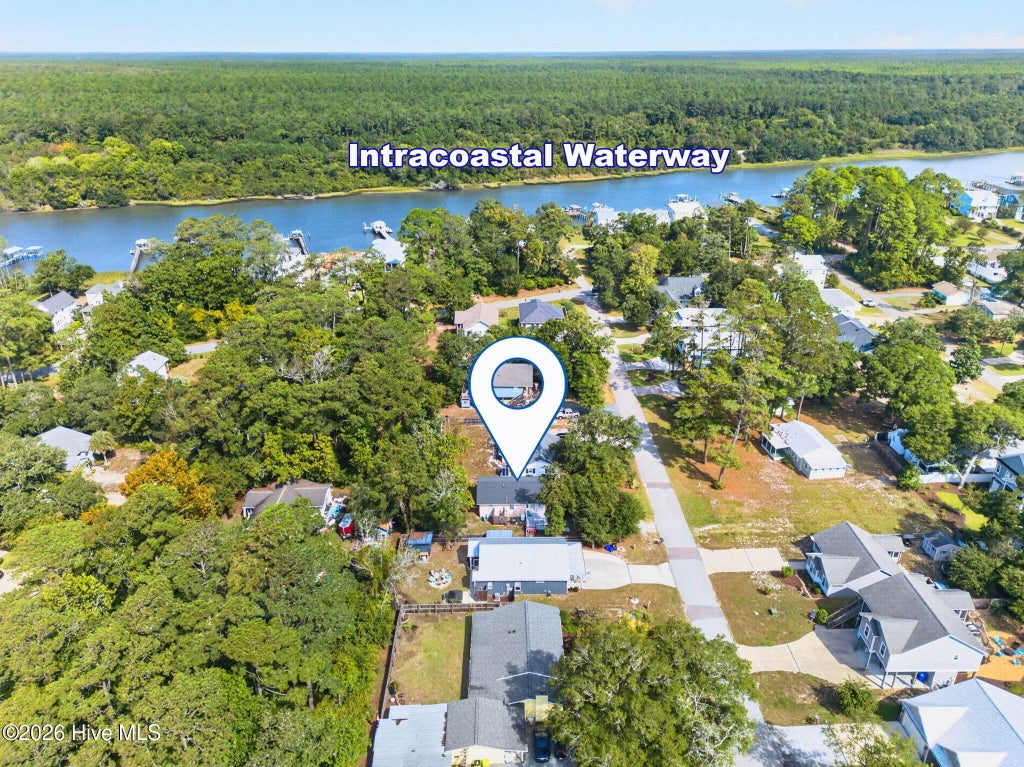 Photo of 129 NW 20th Street, Oak Island, NC 28465 (MLS # 100609195)