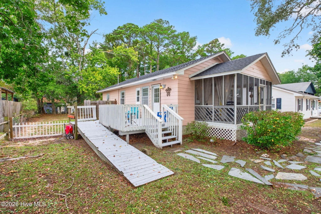 Photo of 129 NW 20th Street, Oak Island, NC 28465 (MLS # 100609195)