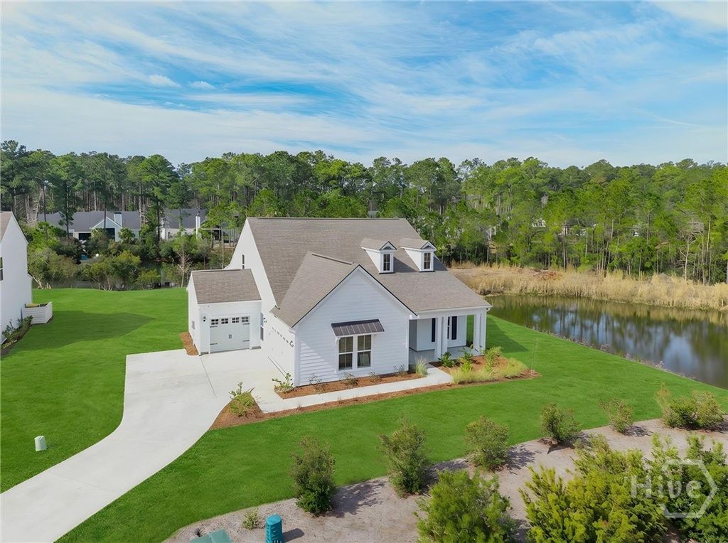 Photo of 289 Heron Creek Drive, Richmond Hill, GA 31324 (MLS # SA349391)