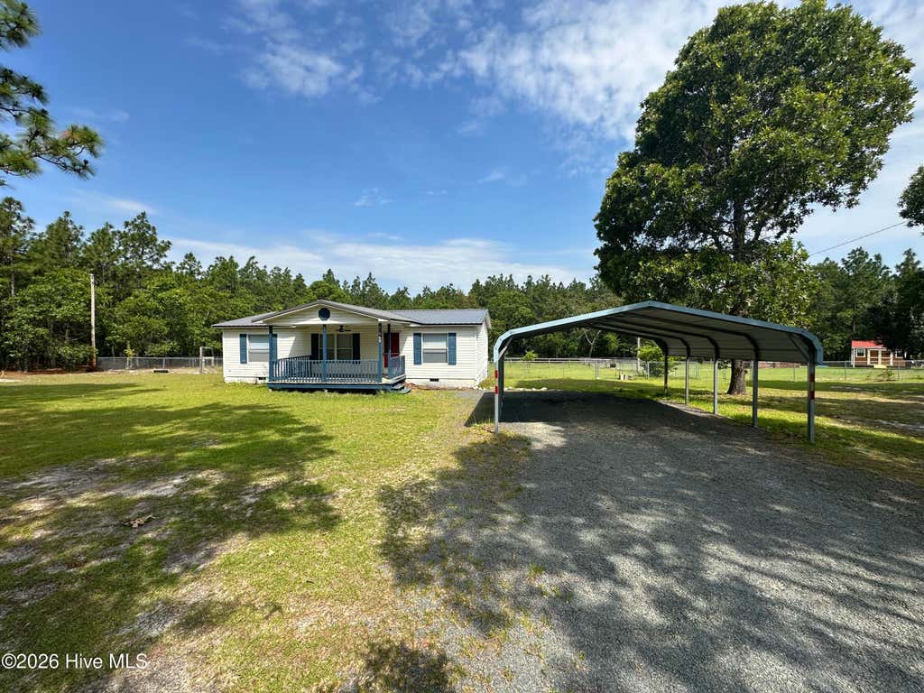 Photo of 21960 Katawba Drive, Laurel Hill, NC 28351 (MLS # 100585122)