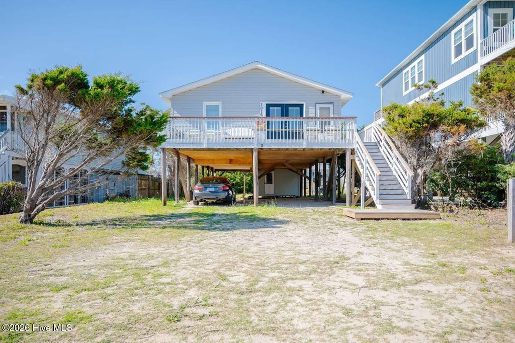Photo of 3016 W Beach Drive, Oak Island, NC 28465 (MLS # 100561729)