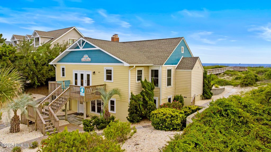 Photo of 419 Caswell Beach Road, Oak Island, NC 28465 (MLS # 100531510)