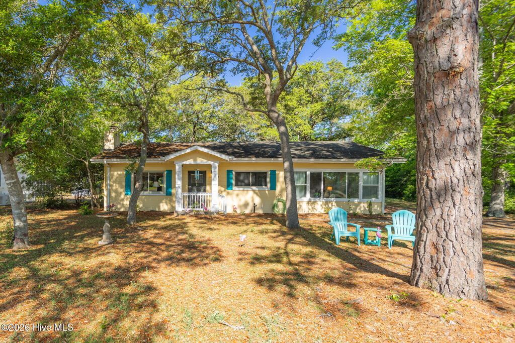 Photo of 313 Mercer Street, Oak Island, NC 28465 (MLS # 100573208)