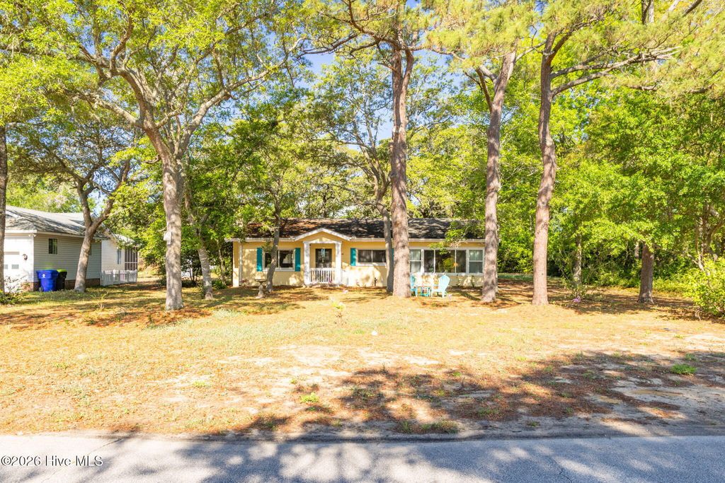 Photo of 313 Mercer Street, Oak Island, NC 28465 (MLS # 100573208)