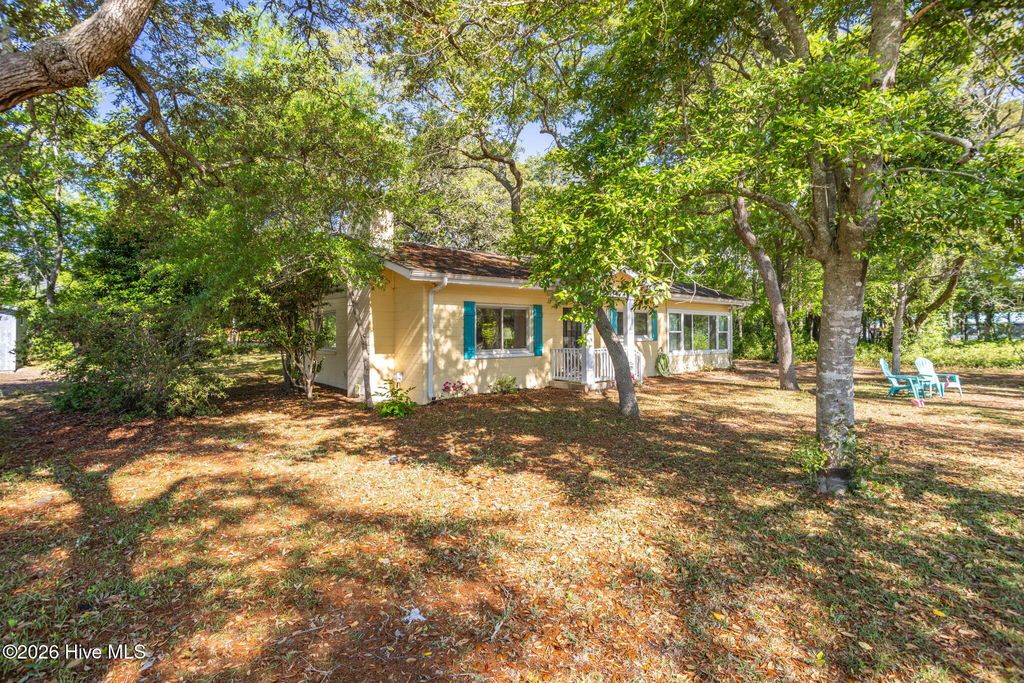 Photo of 313 Mercer Street, Oak Island, NC 28465 (MLS # 100573208)
