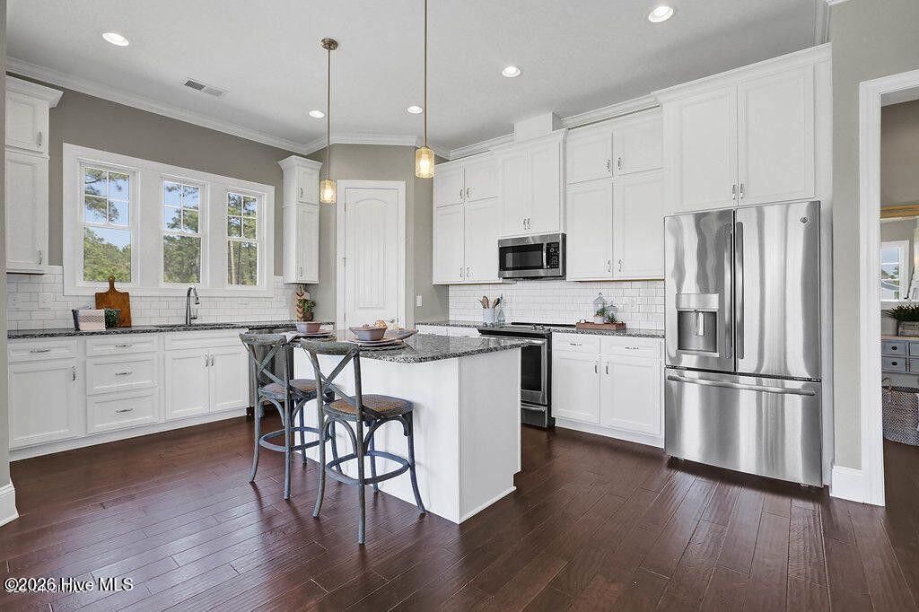 Photo of 145 Spicer Lake Drive, Holly Ridge, NC 28445 (MLS # 100558506)