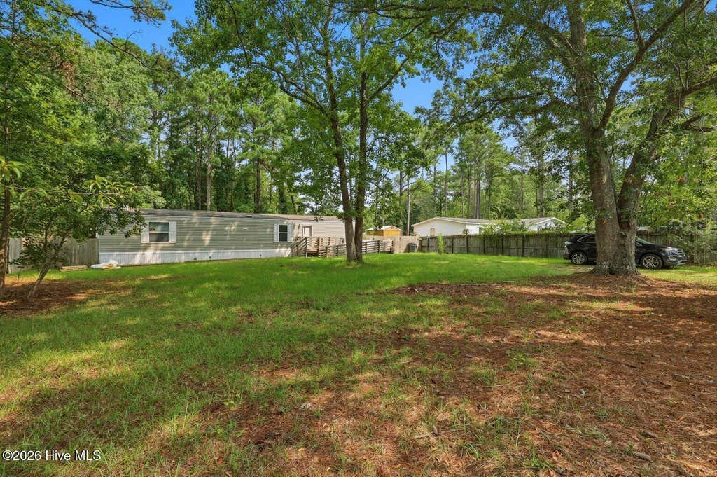 Photo of 1426 Cherrytree Road NE, Winnabow, NC 28479 (MLS # 100593656)