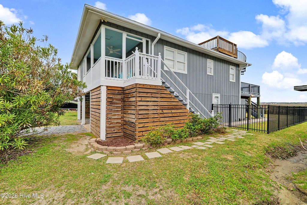 Photo of 512 Caswell Beach Road, Oak Island, NC 28465 (MLS # 100563218)