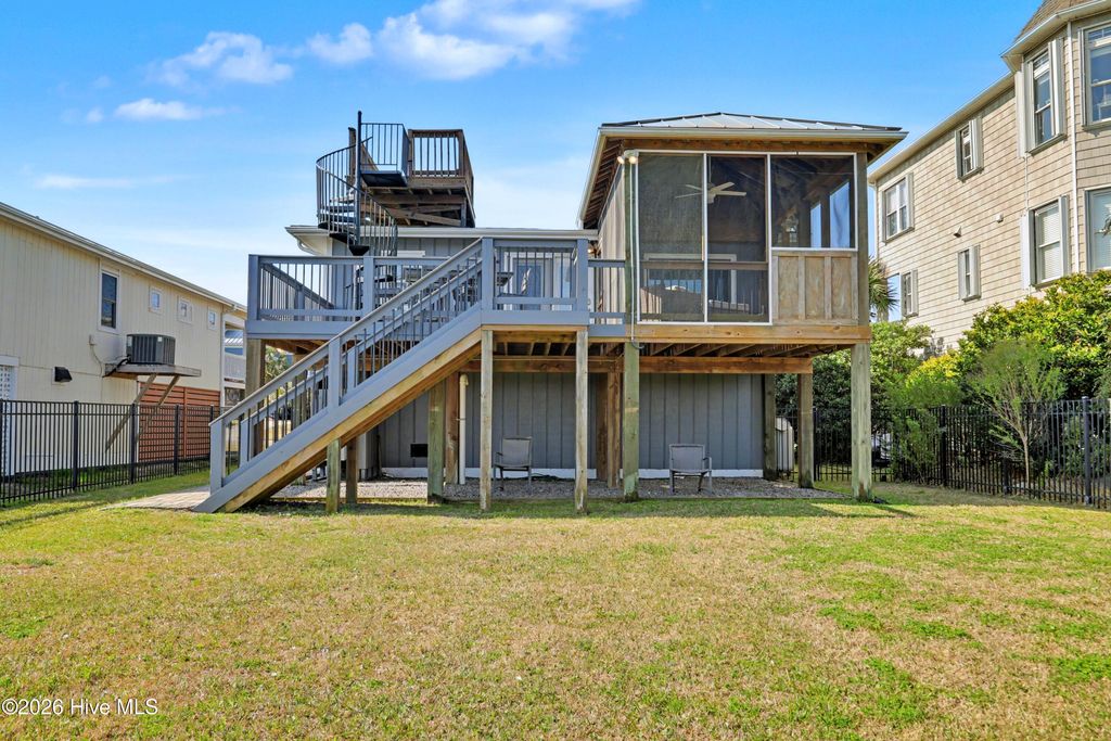Photo of 512 Caswell Beach Road, Oak Island, NC 28465 (MLS # 100563218)
