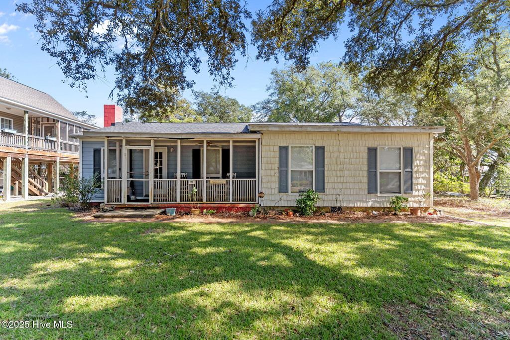 Photo of 116 SE 2nd Street, Oak Island, NC 28465 (MLS # 100536302)