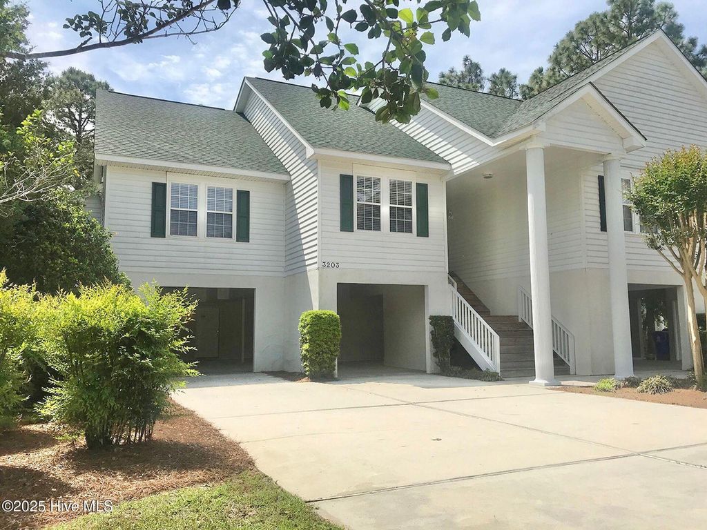 Photo of 3203 St James Drive SE, Southport, NC 28461 (MLS # 100546611)