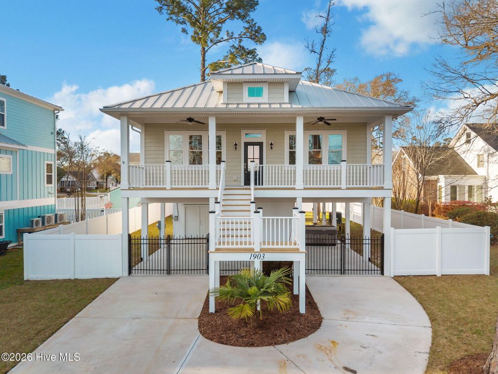 Photo of 1903 W Yacht Drive, Oak Island, NC 28465 (MLS # 100561647)