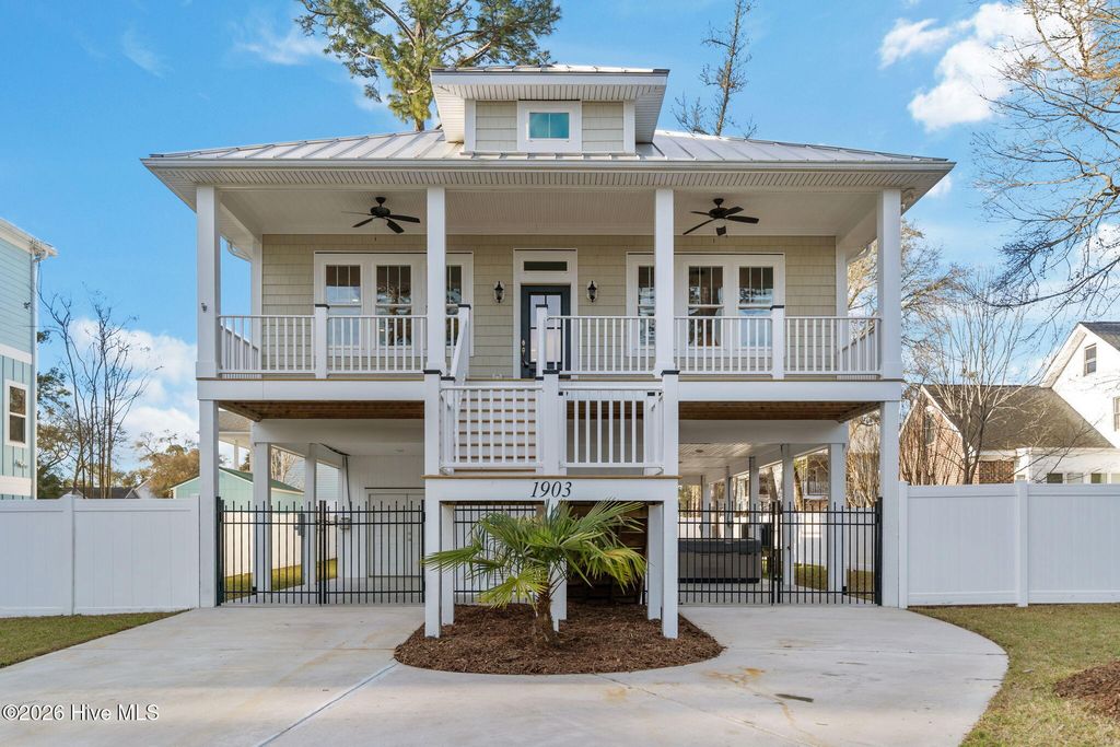 Photo of 1903 W Yacht Drive, Oak Island, NC 28465 (MLS # 100561647)