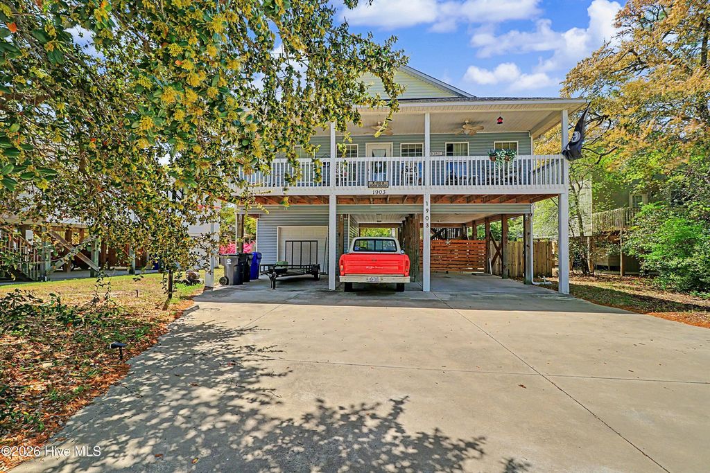 Photo of 1903 E Oak Island Drive, Oak Island, NC 28465 (MLS # 100566536)