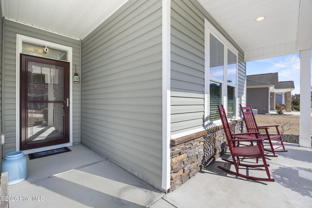 Photo of 12 Lighthouse Cove Loop, Carolina Shores, NC 28467 (MLS # 100551713)