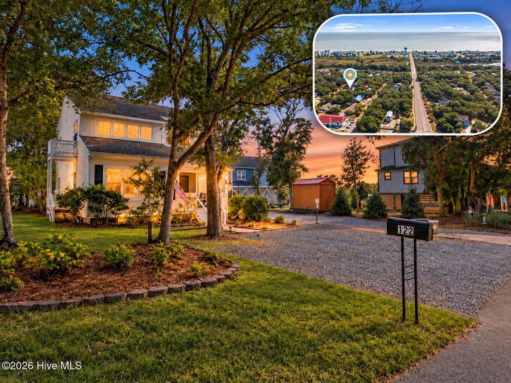 Photo of 122 SE 2nd Street, Oak Island, NC 28465 (MLS # 100609200)