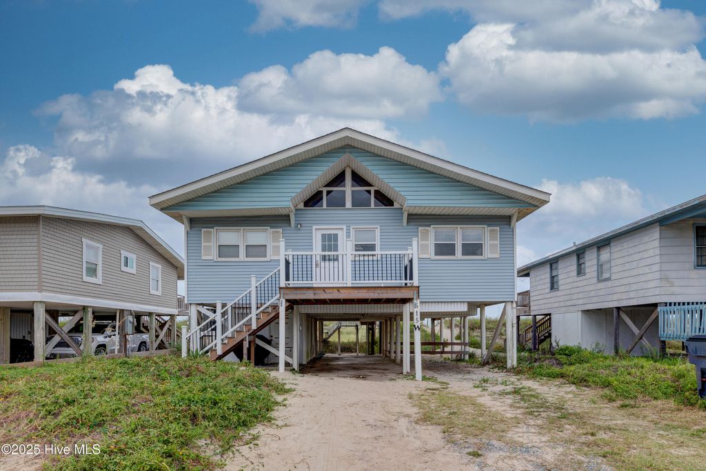 Photo of 515 W Beach Drive, Oak Island, NC 28465 (MLS # 100526581)