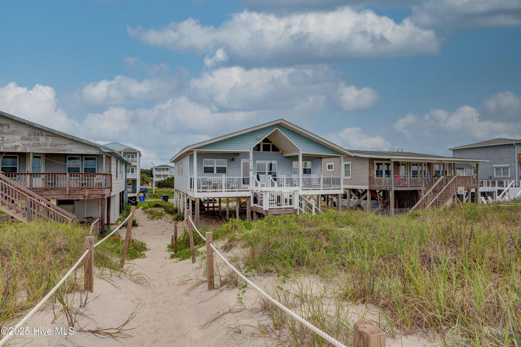 Photo of 515 W Beach Drive, Oak Island, NC 28465 (MLS # 100526581)