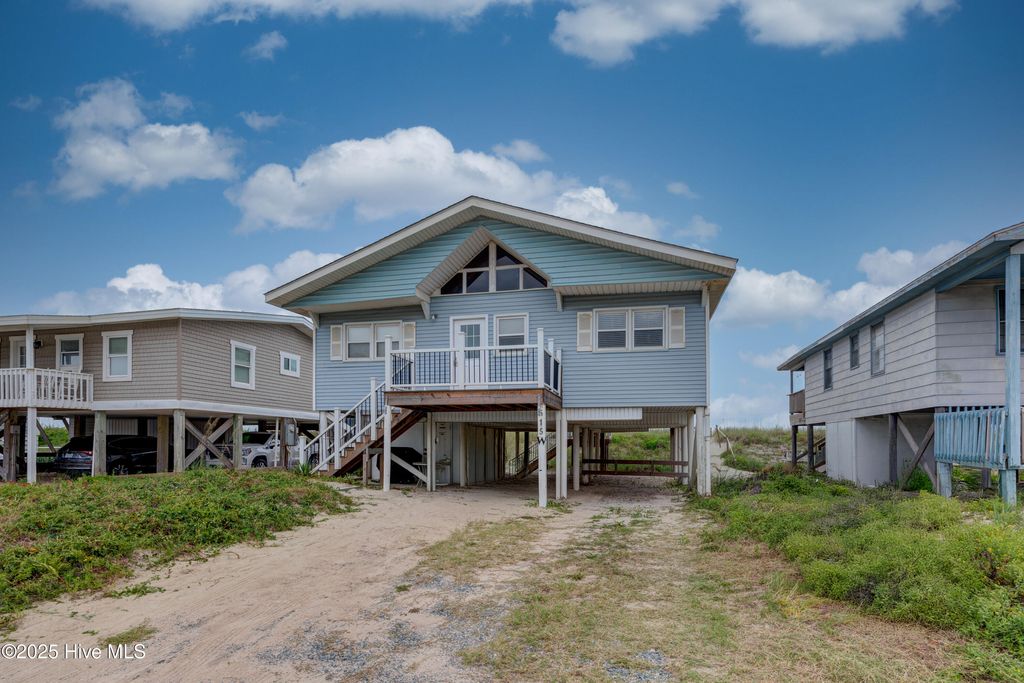 Photo of 515 W Beach Drive, Oak Island, NC 28465 (MLS # 100526581)