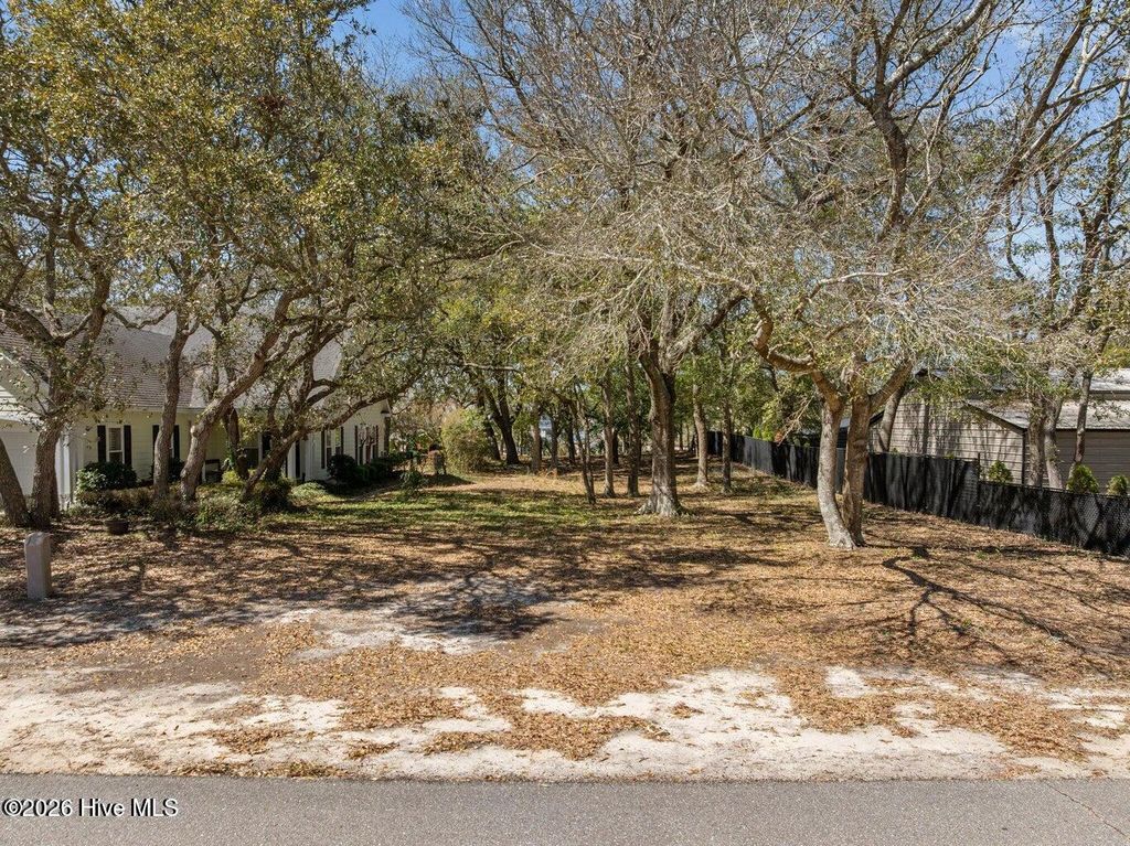 Photo of 121 SW 13th Street, Oak Island, NC 28465 (MLS # 100558934)