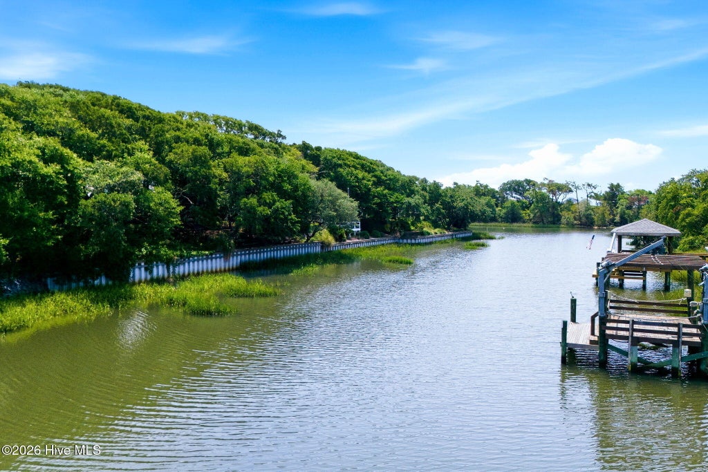 Photo of 121 SW 13th Street, Oak Island, NC 28465 (MLS # 100558934)