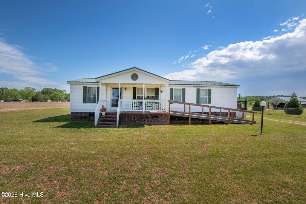 Photo of 10278 Nc-33, Whitakers, NC 27891 (MLS # 100567960)