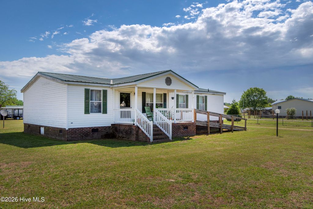 Photo of 10278 Nc-33, Whitakers, NC 27891 (MLS # 100567960)