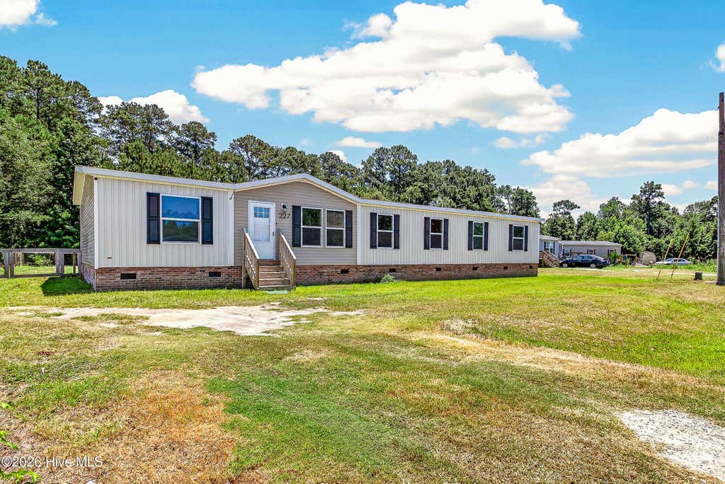 Photo of 227 Mewborn Drive, Beulaville, NC 28518 (MLS # 100589847)