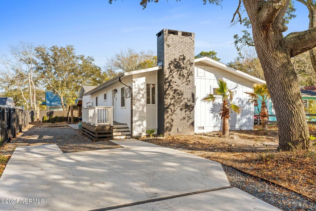 Photo of 226 NE 48th Street, Oak Island, NC 28465 (MLS # 100566764)