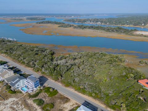 Photo of 10 W Beach Drive, Oak Island, NC 28465 (MLS # 100544249)