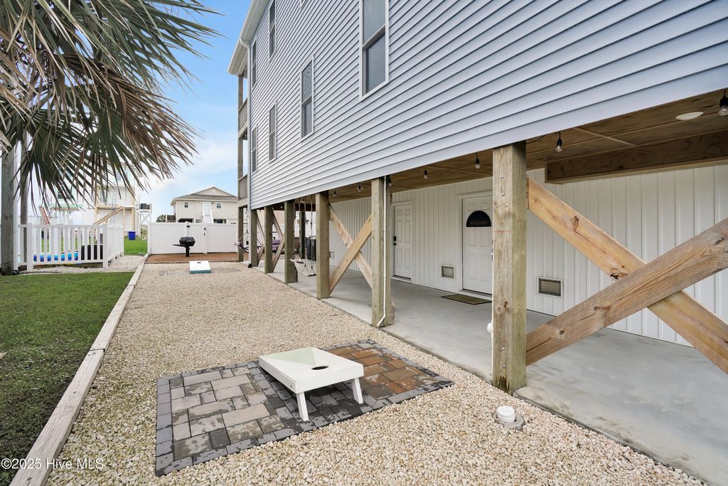 Photo of 5205 E Pelican Drive, Oak Island, NC 28465 (MLS # 100524208)