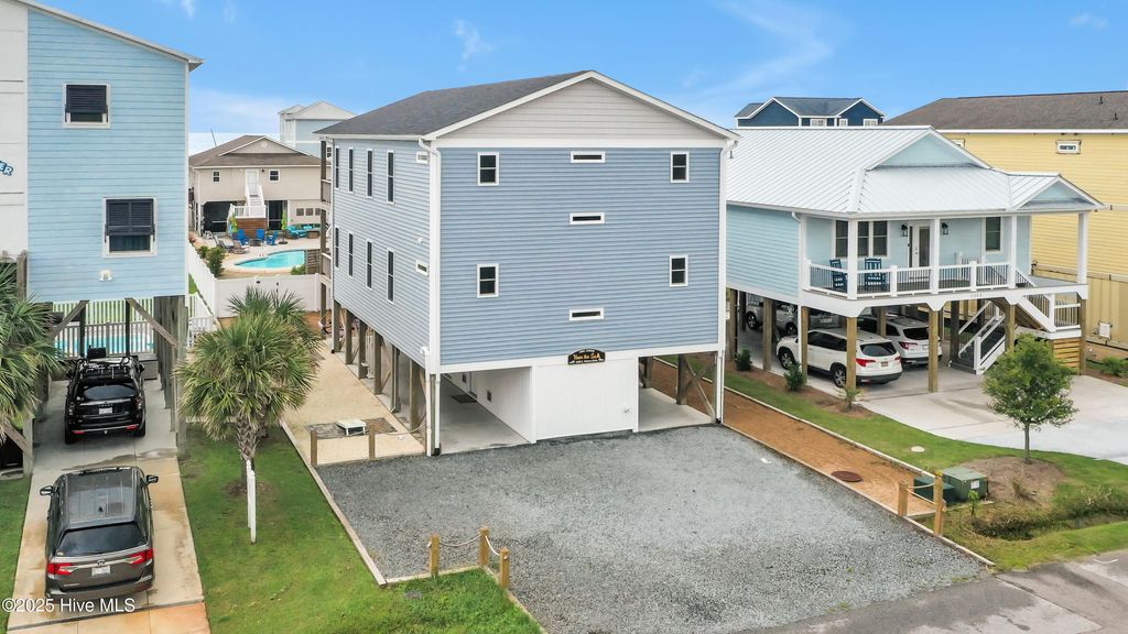 Photo of 5205 E Pelican Drive, Oak Island, NC 28465 (MLS # 100524208)