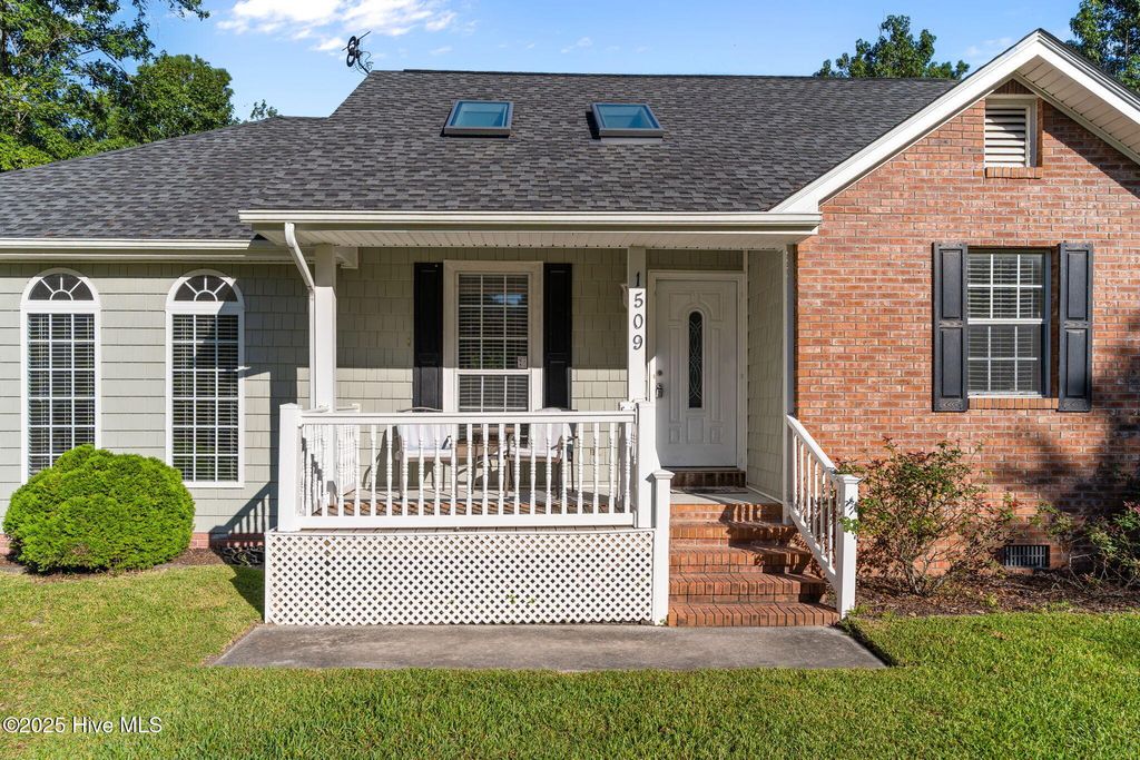 Photo of 1509 Country Club Drive, Hampstead, NC 28443 (MLS # 100527660)