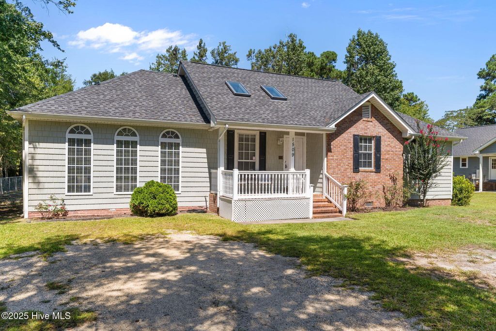 Photo of 1509 Country Club Drive, Hampstead, NC 28443 (MLS # 100527660)