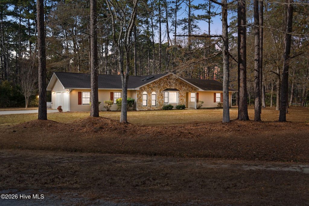 Photo of 42 Pinewood Drive, Carolina Shores, NC 28467 (MLS # 100547566)
