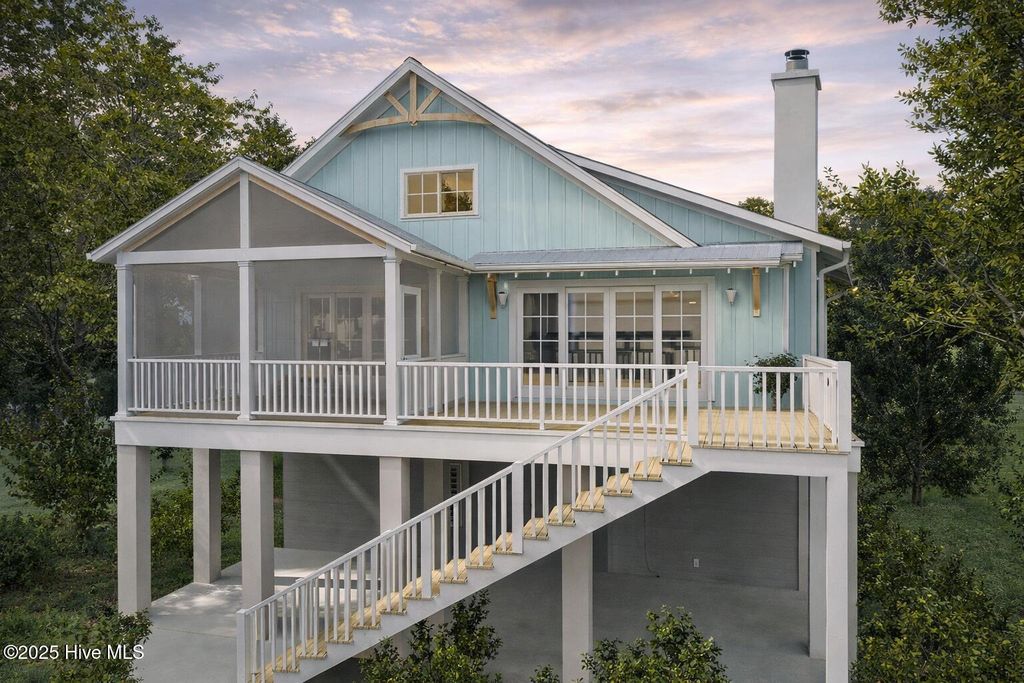 Photo of 138 NE 6th Street, Oak Island, NC 28465 (MLS # 100546859)