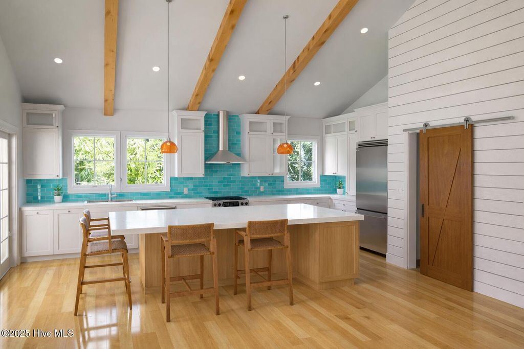 Photo of 138 NE 6th Street, Oak Island, NC 28465 (MLS # 100546859)