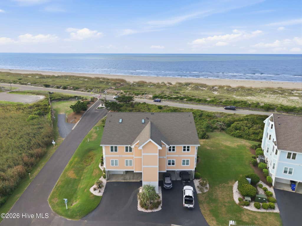 Photo of 66 Foxfire Lane, Oak Island, NC 28465 (MLS # 100590366)