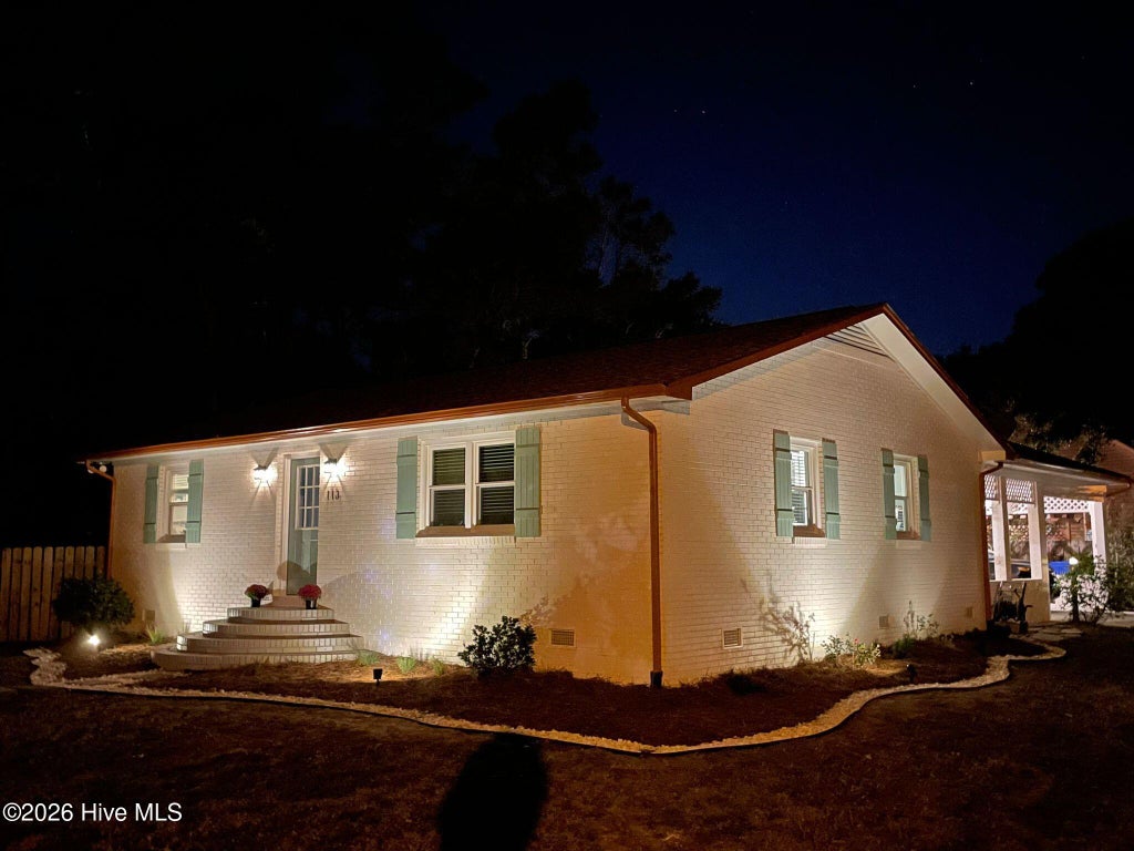 Photo of 113 NE 57th Street, Oak Island, NC 28465 (MLS # 100600018)