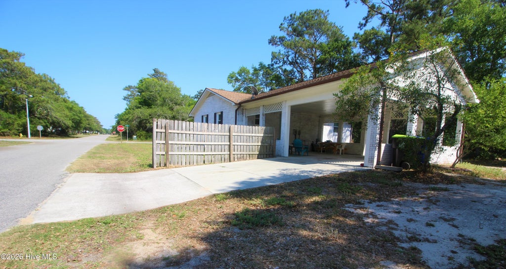 Photo of 113 NE 57th Street, Oak Island, NC 28465 (MLS # 100600018)