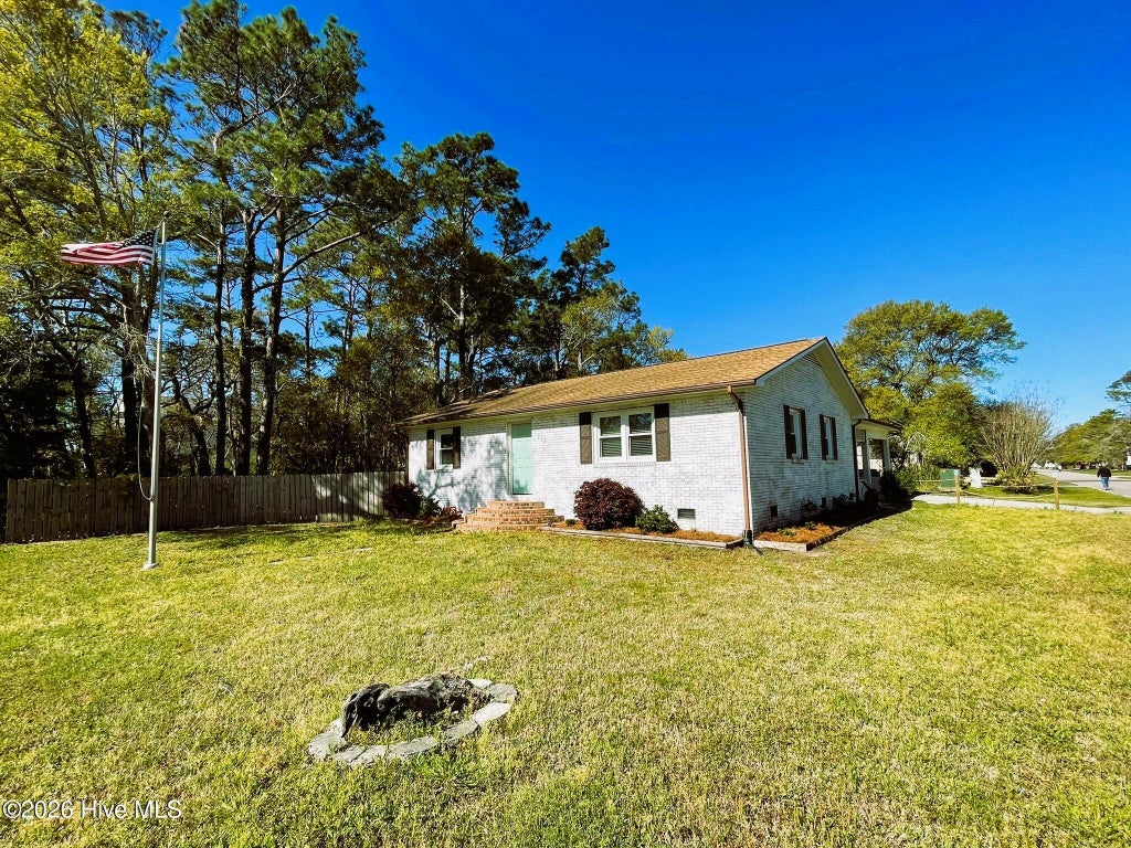 Photo of 113 NE 57th Street, Oak Island, NC 28465 (MLS # 100600018)