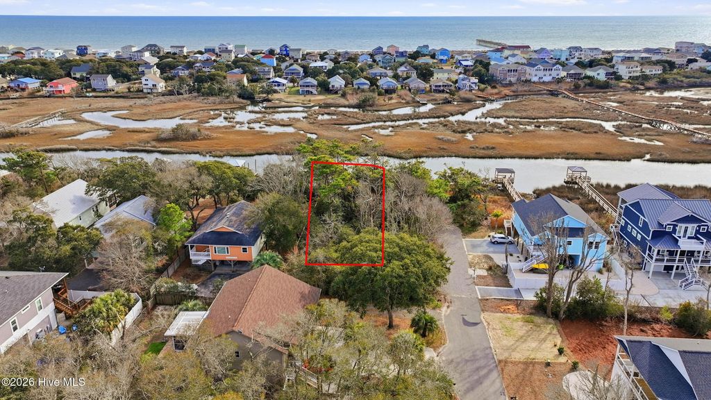 Photo of 120 SE 17th Street, Oak Island, NC 28465 (MLS # 100556752)