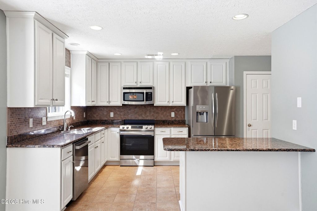 Photo of 8589 Old Forest Drive NE, Leland, NC 28451 (MLS # 100571790)
