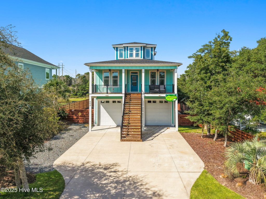 Photo of 604 E Yacht Drive, Oak Island, NC 28465 (MLS # 100527753)