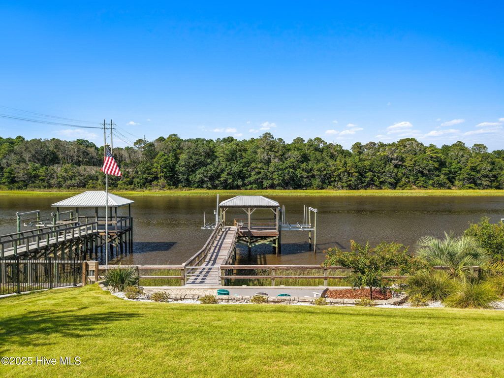 Photo of 604 E Yacht Drive, Oak Island, NC 28465 (MLS # 100527753)