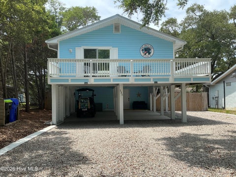 Photo of 135 NW 3rd Street, Oak Island, NC 28465 (MLS # 100584527)