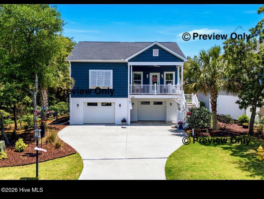 Photo of 124 NE 7th Street, Oak Island, NC 28465 (MLS # 100575142)