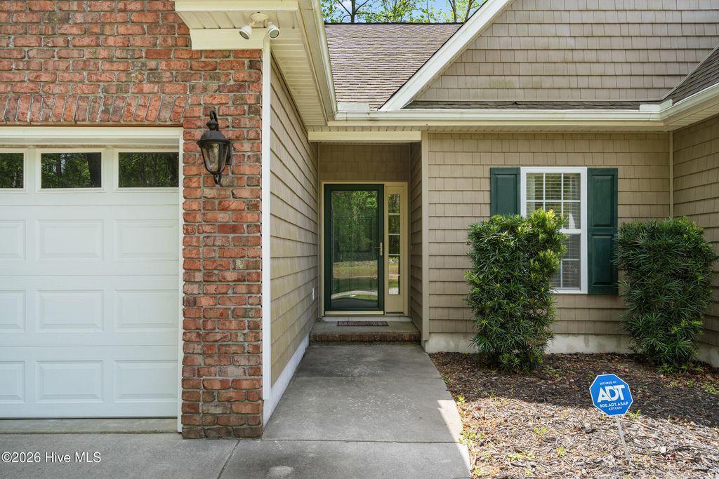 Photo of 119 Cedar Tree Lane SW, Calabash, NC 28467 (MLS # 100566575)