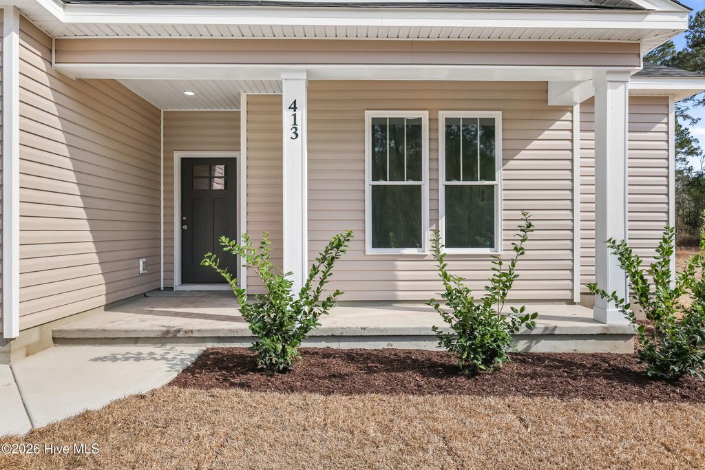 Photo of 413 Timberwind Lane SE, Leland, NC 28451 (MLS # 100558641)