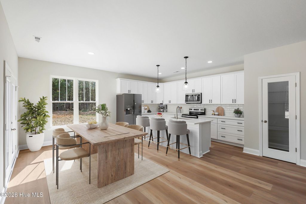 Photo of 413 Timberwind Lane SE, Leland, NC 28451 (MLS # 100558641)